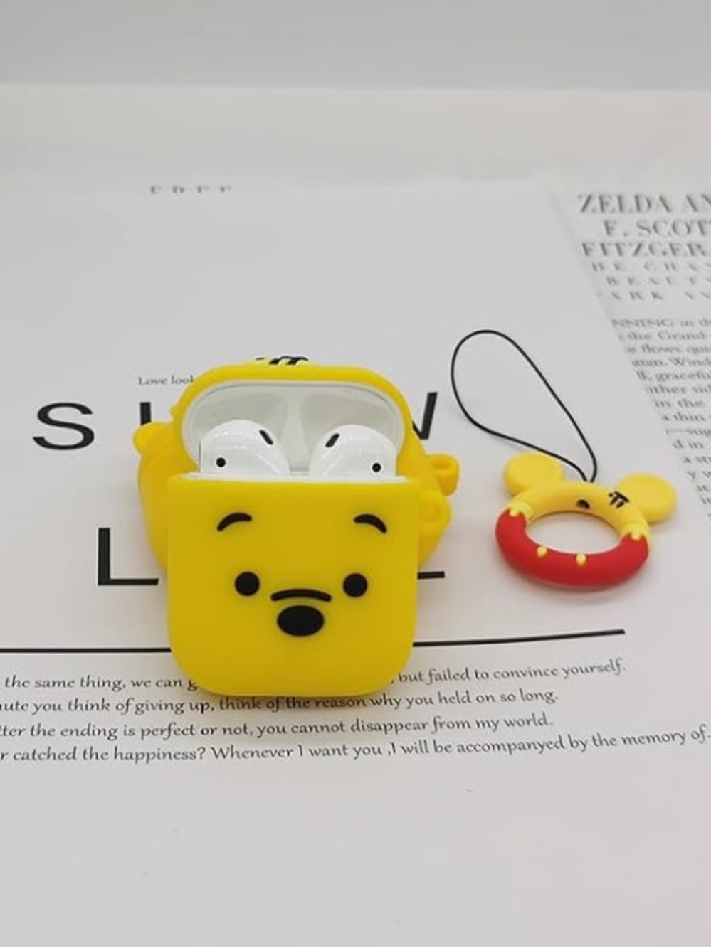 Yellow Winnie the Pooh Silicone AirPods Case with Red Ring Charm Gen 1+2 - Picture 2 of 6